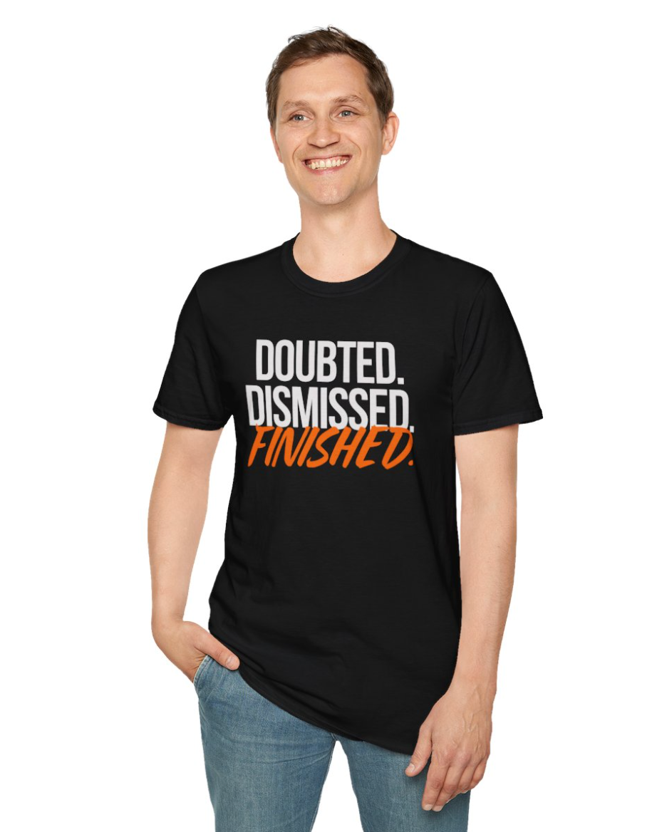 Person wearing a black t-shirt with motivational text on a white background