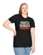 Person wearing a black t-shirt with 'Doubted. Dismissed. Finished.' text on a white background